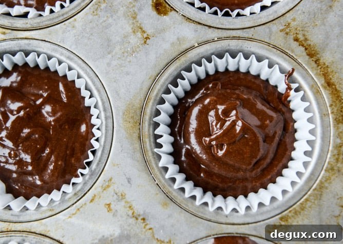Chocolate Coconut Cream Cupcakes Recipe for Decadent Dessert 5 chocolate coconut cream cupcakes I howsweeteats.com