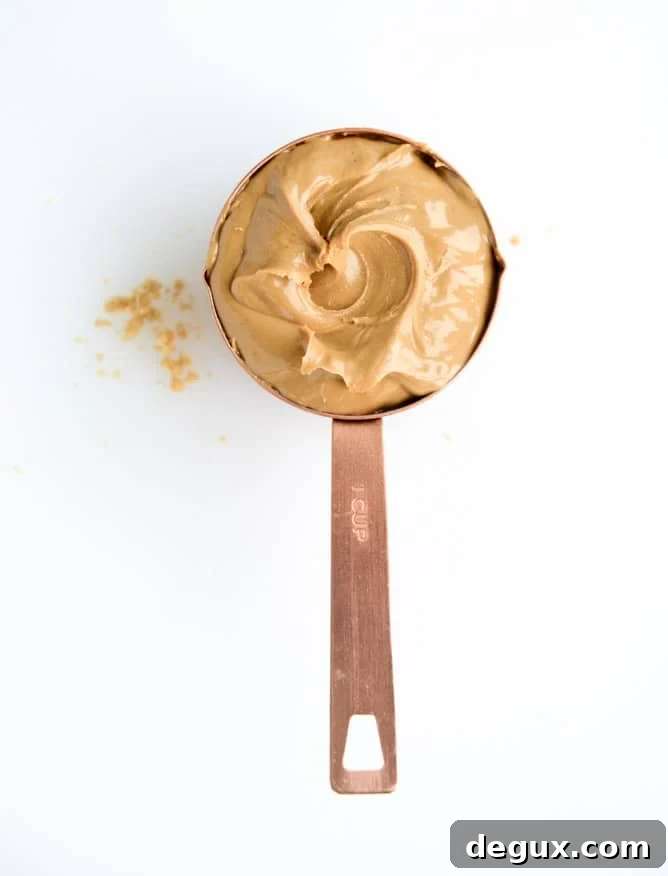 peanut butter cheesecake with whipped marshmallow and bananas I howsweeteats.com