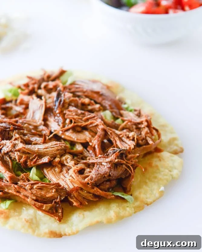 Crispy Pulled Pork Tostadas with Tangy Slaw and Avocado 4 pulled pork tostadas I howsweeteats.com