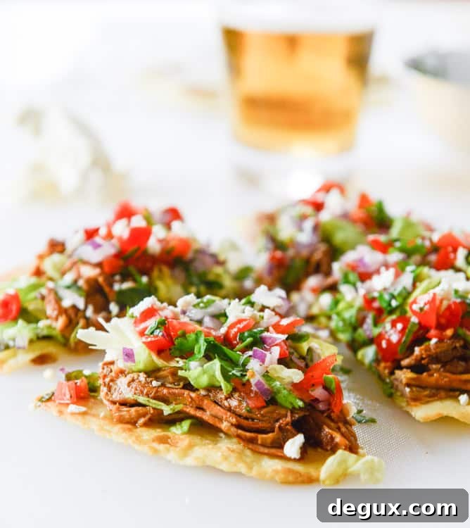 Crispy Pulled Pork Tostadas with Tangy Slaw and Avocado 8 pulled pork tostadas I howsweeteats.com
