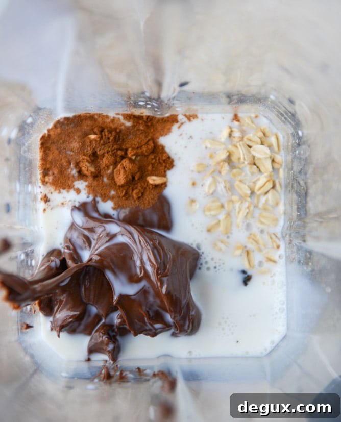 Nutella Oatmeal Cookie Milkshake Recipe 4 nutella oatmeal cookie shake I howsweeteats.com