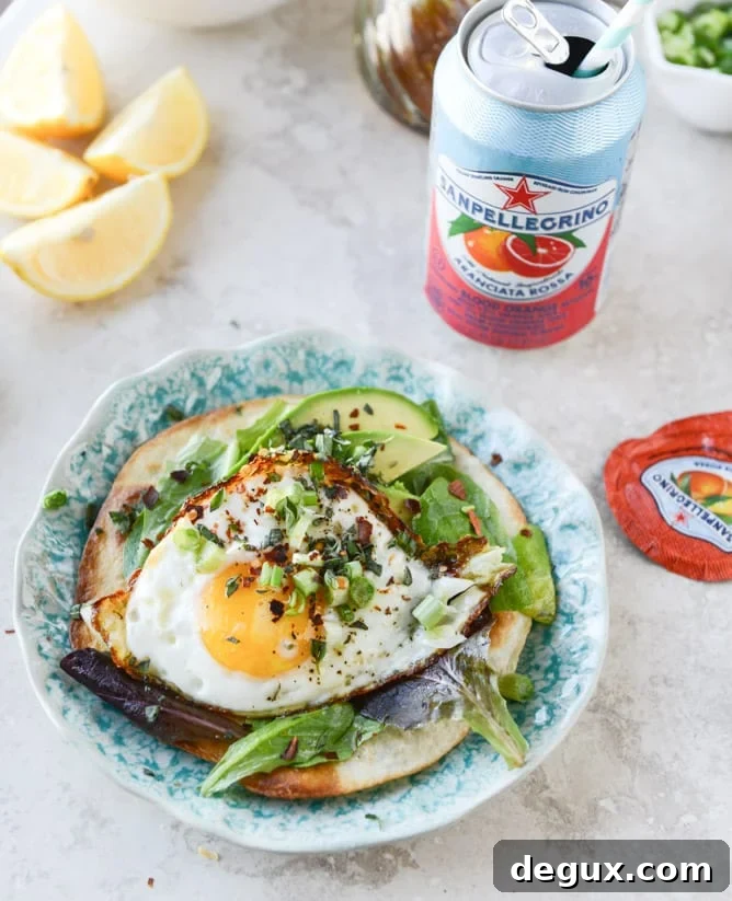 Crispy Egg Tostadas with Lemon Greens & Toasted Sesame Oil 2 Fried Egg Crispy Tortillas with Lemon Greens and Toasted Sesame Oil I howsweeteats.com