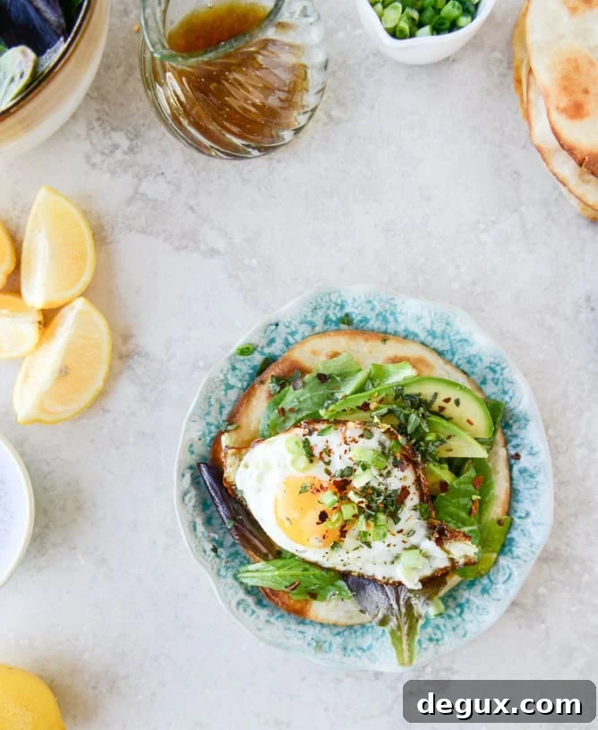 Crispy Egg Tostadas with Lemon Greens & Toasted Sesame Oil 5 Fried Egg Crispy Tortillas with Lemon Greens and Toasted Sesame Oil I howsweeteats.com