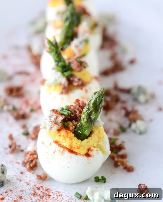 bacon blue deviled eggs with roasted garlic and asparagus I howsweeteats.com