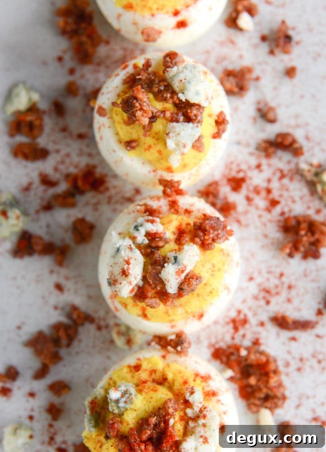 bacon blue deviled eggs with roasted garlic and asparagus I howsweeteats.com