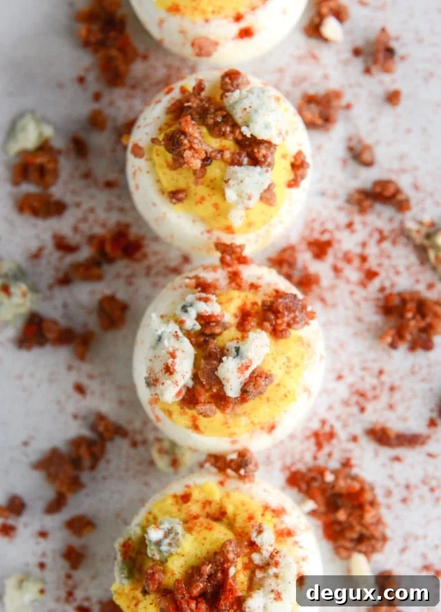 bacon blue deviled eggs with roasted garlic and asparagus I howsweeteats.com
