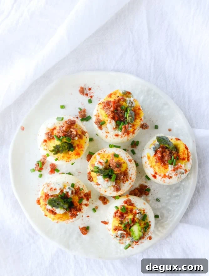 bacon blue deviled eggs with roasted garlic and asparagus I howsweeteats.com