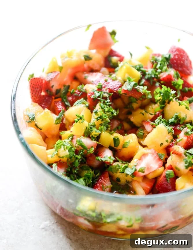 strawberry mango mint julep fruit salad with whipped marshmallow I howsweeteats.com