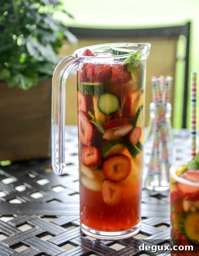 Strawberry Pimm's Cup Cocktail Recipe for Summer Gatherings 9 strawberry pimm's cups I howsweeteats.com