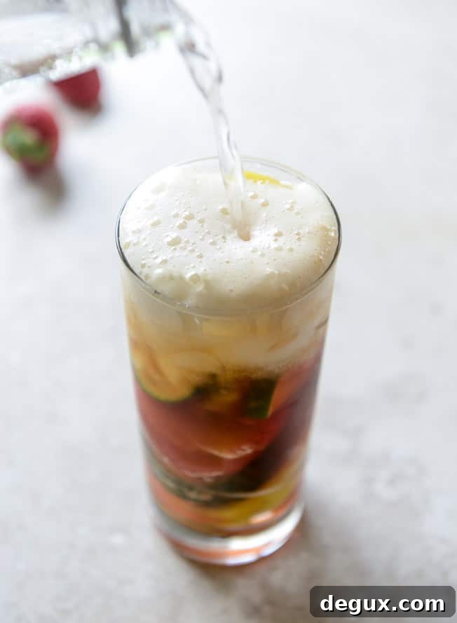 Strawberry Pimm's Cup Cocktail Recipe for Summer Gatherings 4 strawberry pimm's cups I howsweeteats.com
