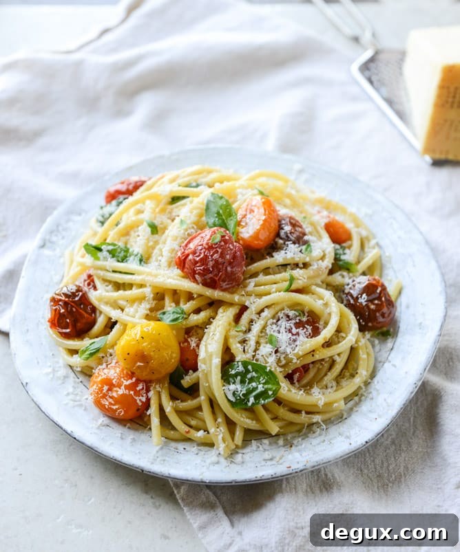 roasted garlic butter bucatini with burst tomatoes I howsweeteats.com