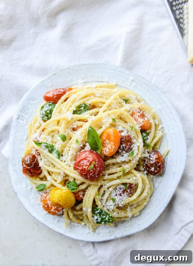 roasted garlic butter bucatini with burst tomatoes I howsweeteats.com