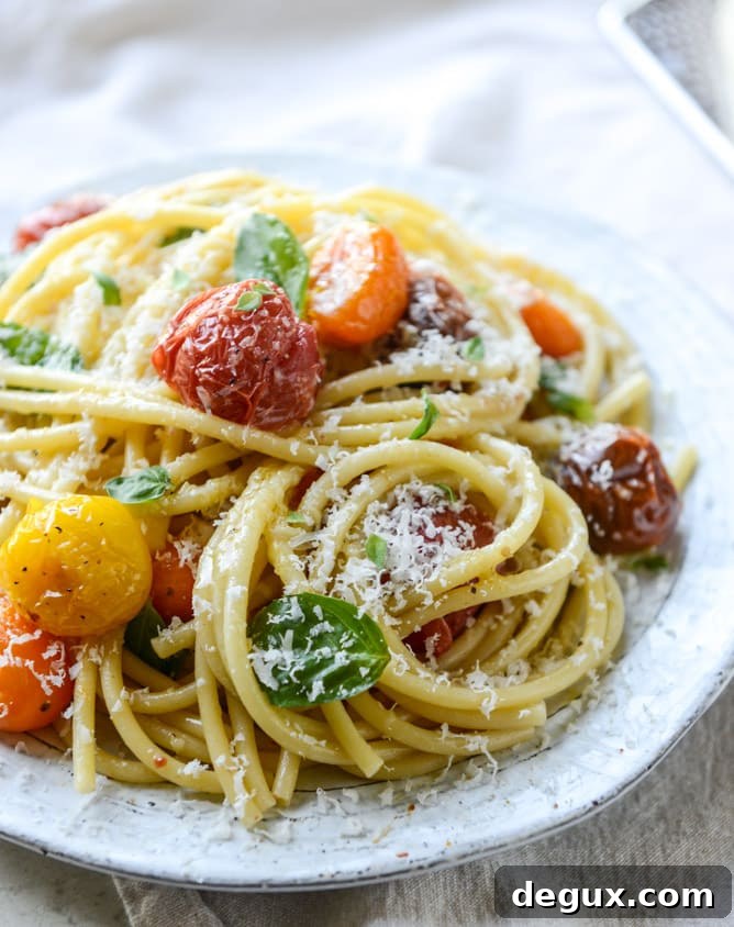 roasted garlic butter bucatini with burst tomatoes I howsweeteats.com