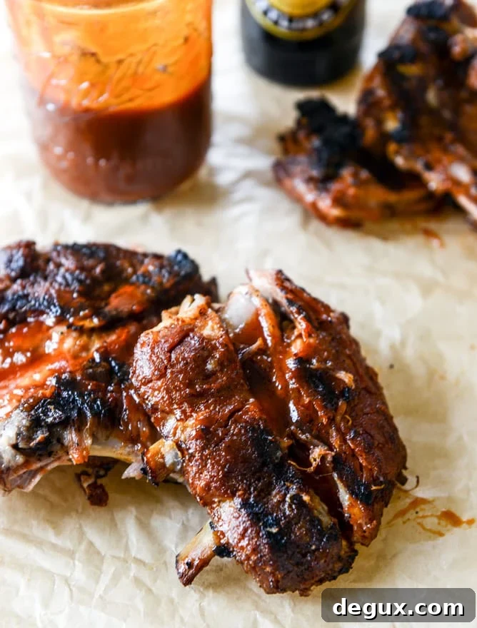 Grilled Baby Back Ribs with Root Beer BBQ Sauce I howsweeteats.com