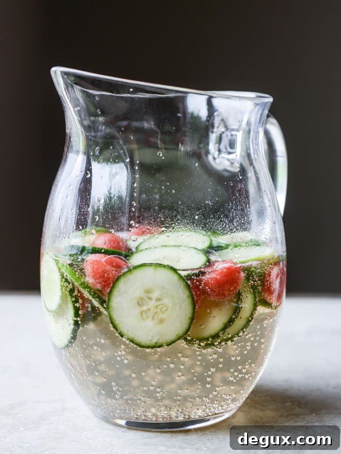 Sparkling Cucumber & Watermelon Sangria Recipe 4 sparkling watermelon cucumber sangria I howsweeteats.com
