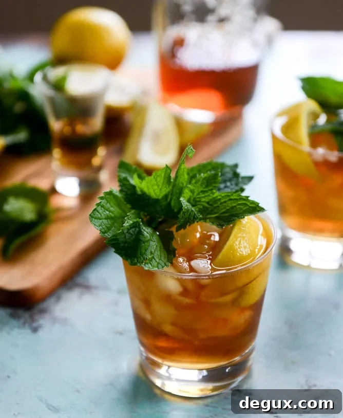 Bourbon Mint Iced Tea Recipe: Refreshing Summer Cocktail Drink 5 bourbon mint iced tea I howsweeteats.com