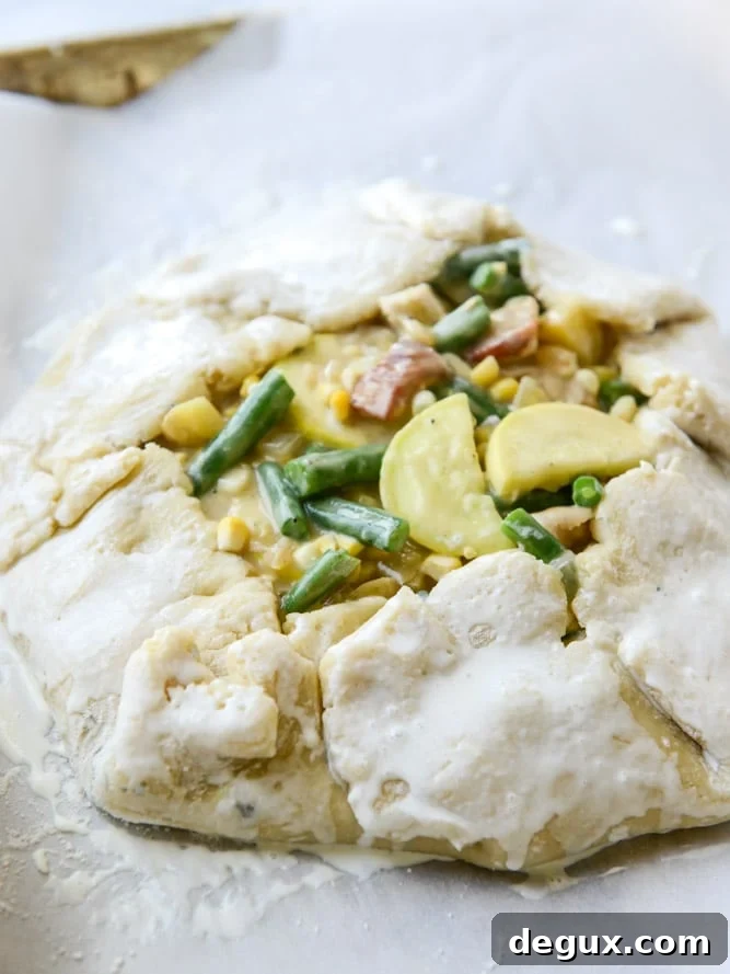 summer chicken pot pie galette with herbed crust I howsweeteats.com