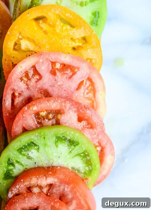 Heirloom Tomato, Avocado & Burrata Salad on Grilled Garlic Toast 4 heirloom tomato, avocado and burrata grilled garlic toast I howsweeteats.com