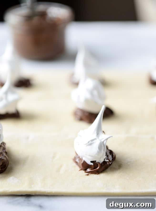 Nutella S'mores Puff Pastry Pop-Tarts Recipe 4 nutella s'mores puff pastry pop tarts I howsweeteats.com