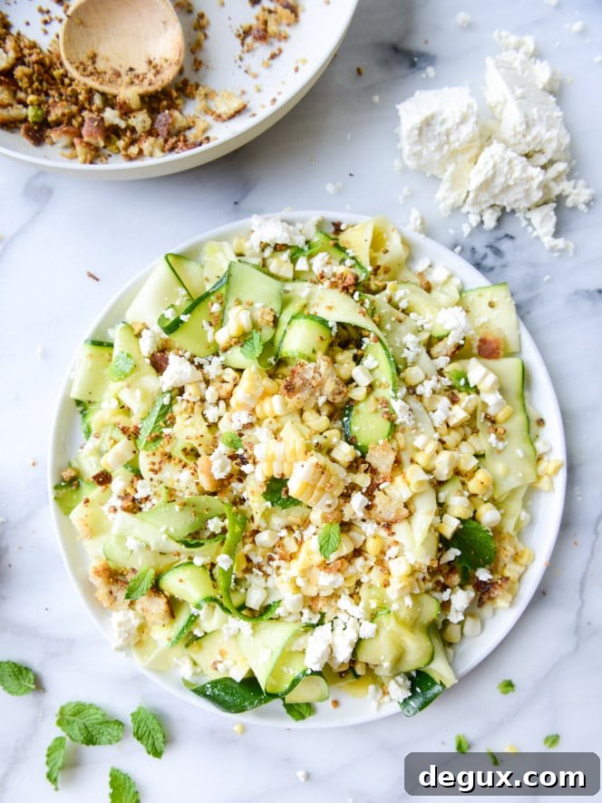 marinated zucchini feta salad with fresh corn and toasted pistachio breadcrumbs I howsweeteats.com