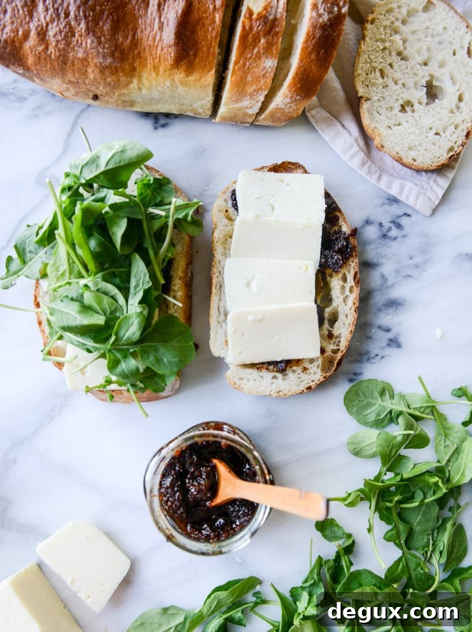 havarti and arugula grilled cheese with bacon jam and triple herb butter I howsweeteats.com