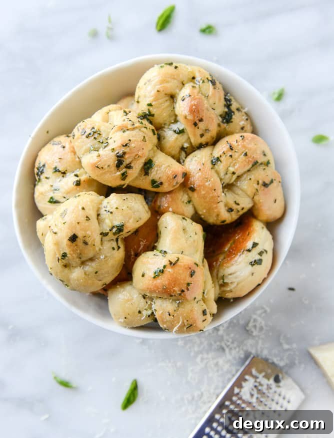 Brown Butter Garlic Herb Knots: Crispy, Savory Dinner Rolls 8 brown butter herb garlic knots I howsweeteats.com