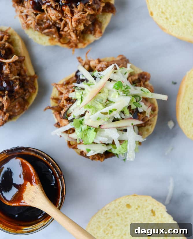 Pomegranate BBQ Chicken Sandwiches with Crunchy Apple Slaw 7 saucy chicken sandwiches with pomegranate bbq sauce and crunchy apple slaw I howsweeteats.com