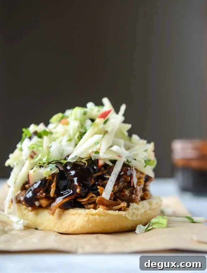 Pomegranate BBQ Chicken Sandwiches with Crunchy Apple Slaw 8 saucy chicken sandwiches with pomegranate bbq sauce and crunchy apple slaw I howsweeteats.com