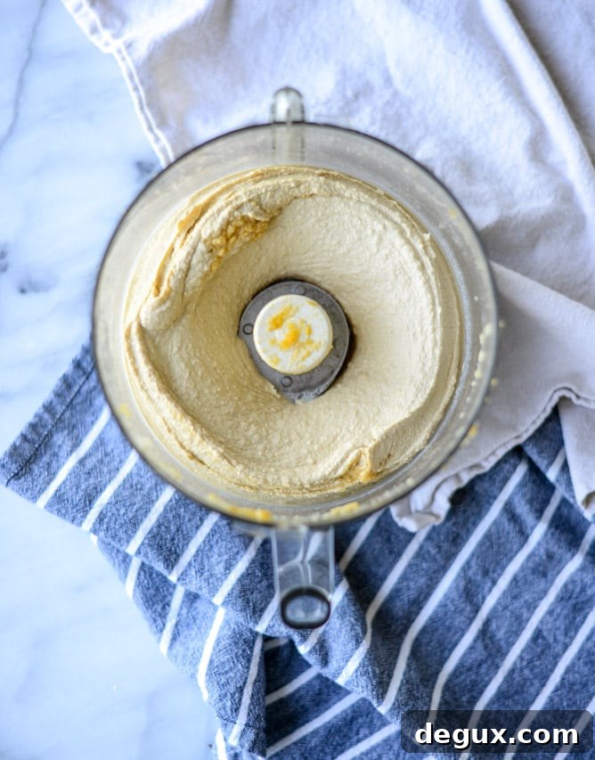 Roasted Butternut Squash Hummus Recipe (Step-by-Step Video) 3 roasted butternut squash hummus I howsweeteats.com