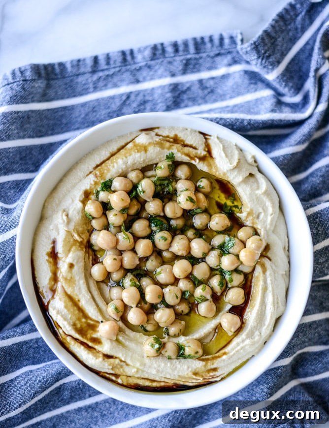 Roasted Butternut Squash Hummus Recipe (Step-by-Step Video) 4 roasted butternut squash hummus I howsweeteats.com
