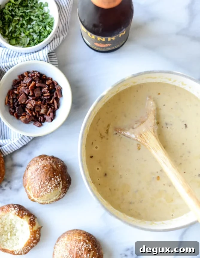 cider cheese soup shooters in mini pretzel bread bowls I howsweeteats.com