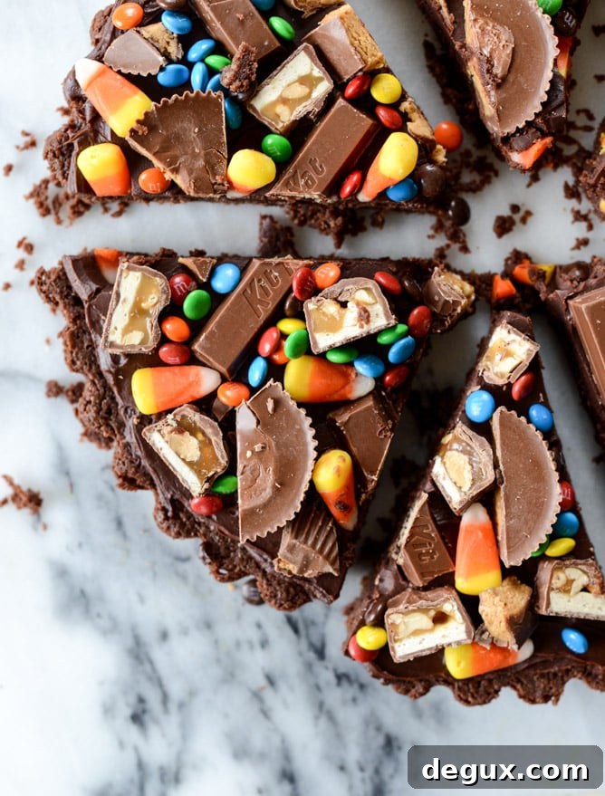 Peanut Butter and Nutella Candy Bar Brownies: Gooey Chocolate Treat 8 peanut butter nutella candy bar brownie I howsweeteats.com
