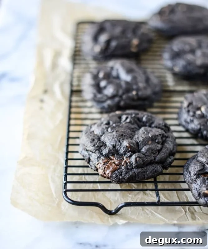double dark chocolate peanut butter cup cookies I howsweeteats.com