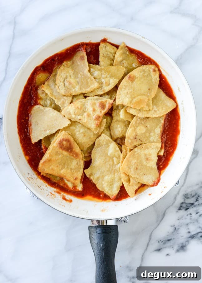 Skillet Chilaquiles Recipe: Crispy Tortillas in Spicy Salsa Verde 3 easy skillet chilaquiles I howsweeteats.com