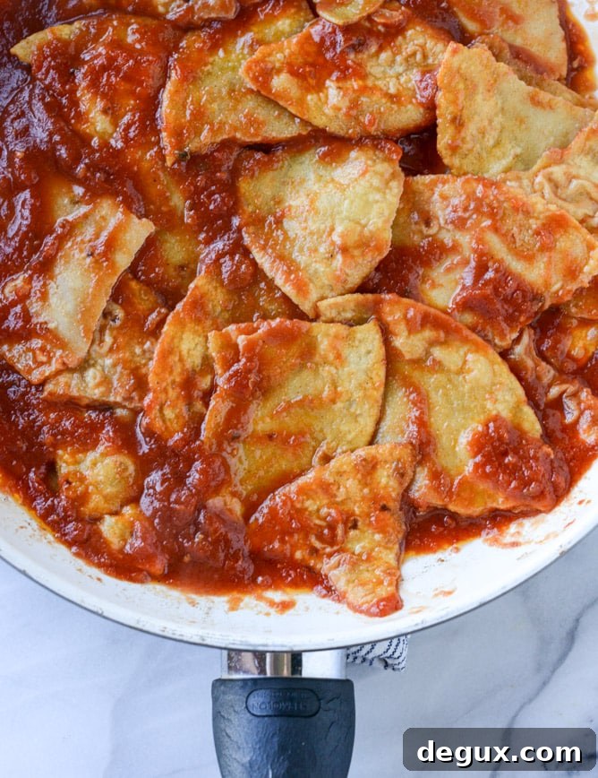 Skillet Chilaquiles Recipe: Crispy Tortillas in Spicy Salsa Verde 4 easy skillet chilaquiles I howsweeteats.com