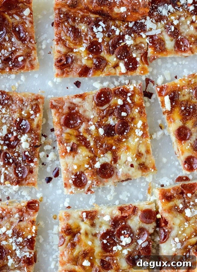 Pepperoni Puff Pastry Pizza Bites: Quick Party Appetizer 2 super easy pepperoni pizza puff pastry I howsweeteats.com