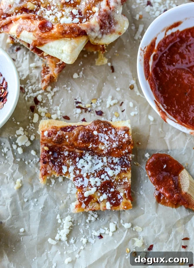 Pepperoni Puff Pastry Pizza Bites: Quick Party Appetizer 8 super easy pepperoni pizza puff pastry I howsweeteats.com