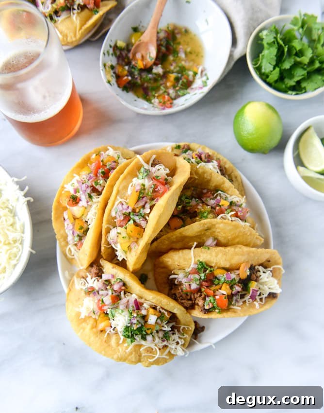 How to Make Puffy Tacos at Home: Crispy, Puffy Taco Recipe 2 the best beef puffy tacos I howsweeteats.com