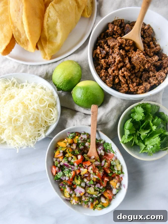 How to Make Puffy Tacos at Home: Crispy, Puffy Taco Recipe 6 the best beef puffy tacos I howsweeteats.com