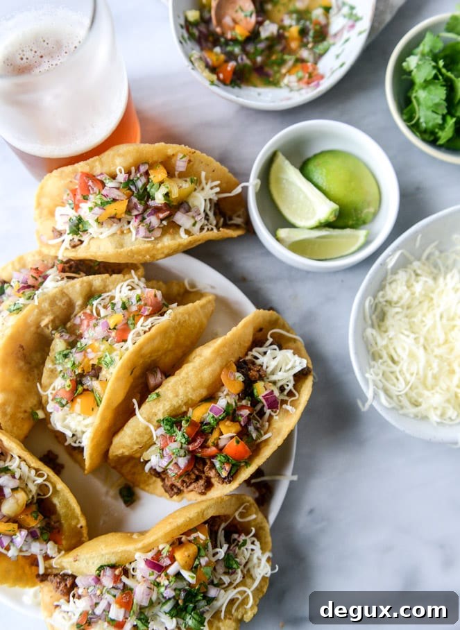 How to Make Puffy Tacos at Home: Crispy, Puffy Taco Recipe 8 the best beef puffy tacos I howsweeteats.com
