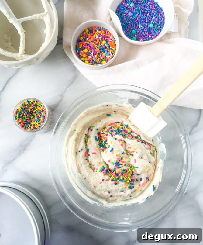 Mini Sprinkle Smash Cake Ideas for Colorful First-Birthday Photos 3 mini sprinkle smash cake I howsweeteats.com