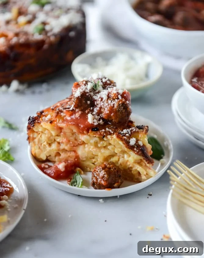 cheesy bucatini pie with mini meatballs I howsweeteats.com