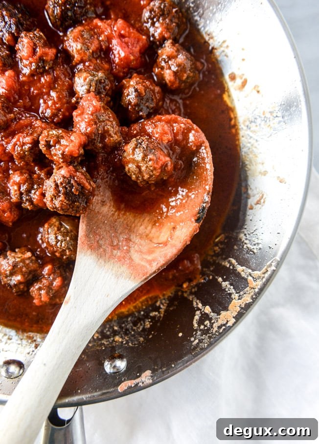 Cheesy Bucatini Pie with Mini Meatballs Recipe 4 cheesy bucatini pie with mini meatballs I howsweeteats.com