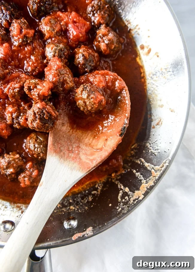 cheesy bucatini pie with mini meatballs I howsweeteats.com
