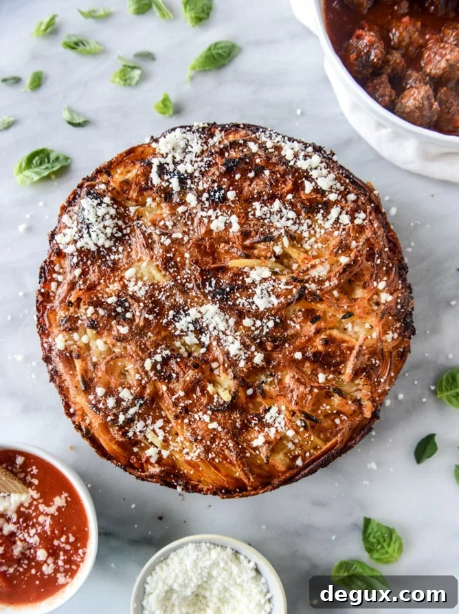 cheesy bucatini pie with mini meatballs I howsweeteats.com