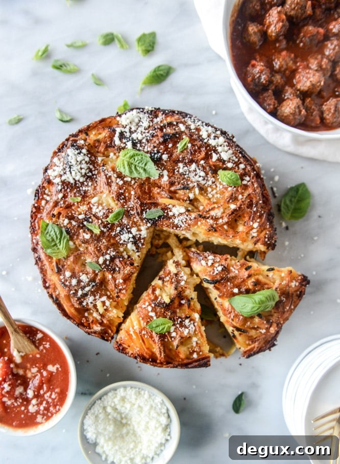 Cheesy Bucatini Pie with Mini Meatballs Recipe 8 cheesy bucatini pie with mini meatballs I howsweeteats.com