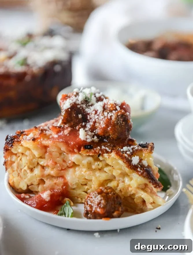 cheesy bucatini pie with mini meatballs I howsweeteats.com