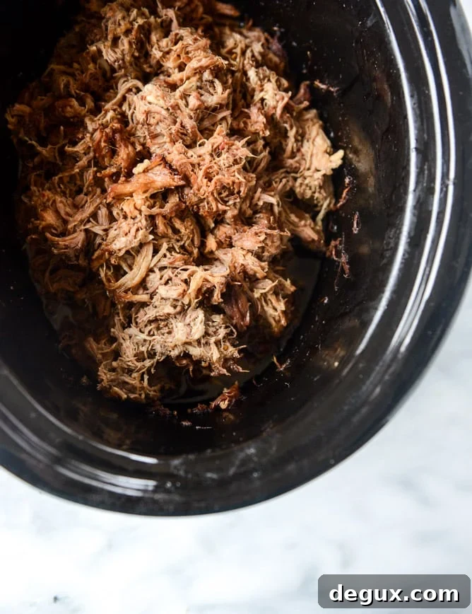 slow cooker sweet and spicy pork shoulder I howsweeteats.com