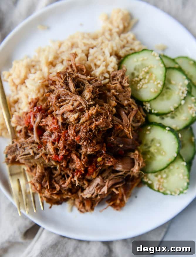 slow cooker sweet and spicy pork shoulder I howsweeteats.com