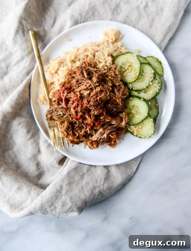 slow cooker sweet and spicy pork shoulder I howsweeteats.com